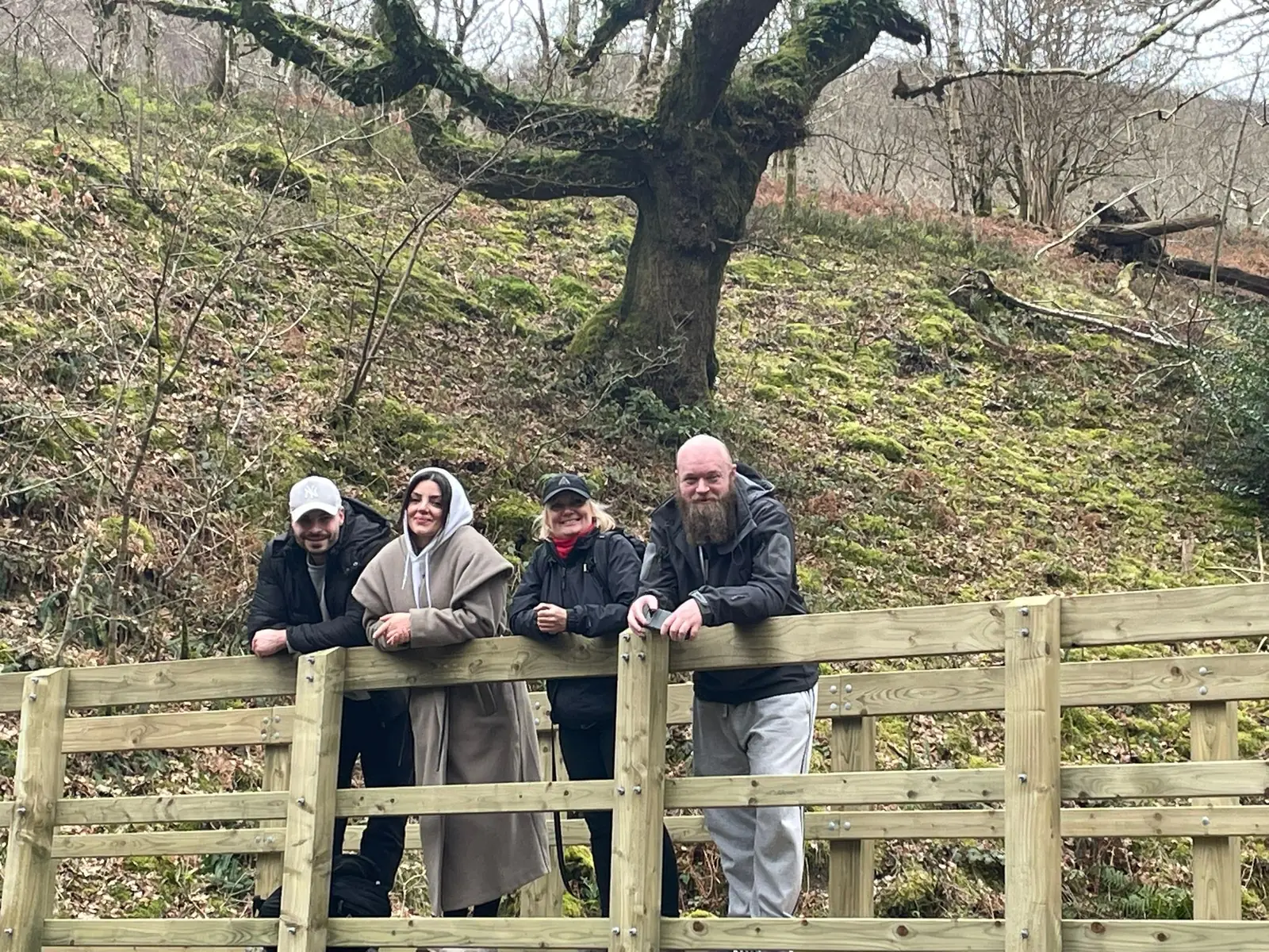 Lifted Spirits members together on a bridge in the Elan Valley