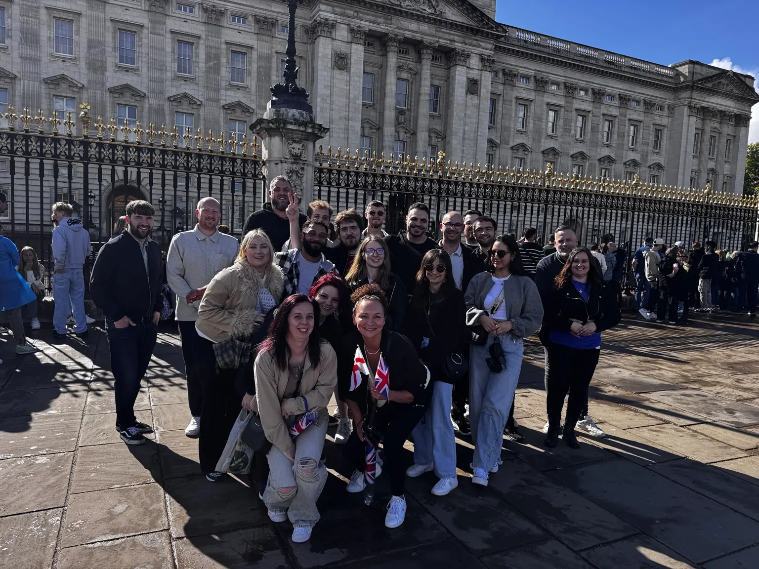 Lifted Spirits members together near Buckingham Palace during a London community meet-up