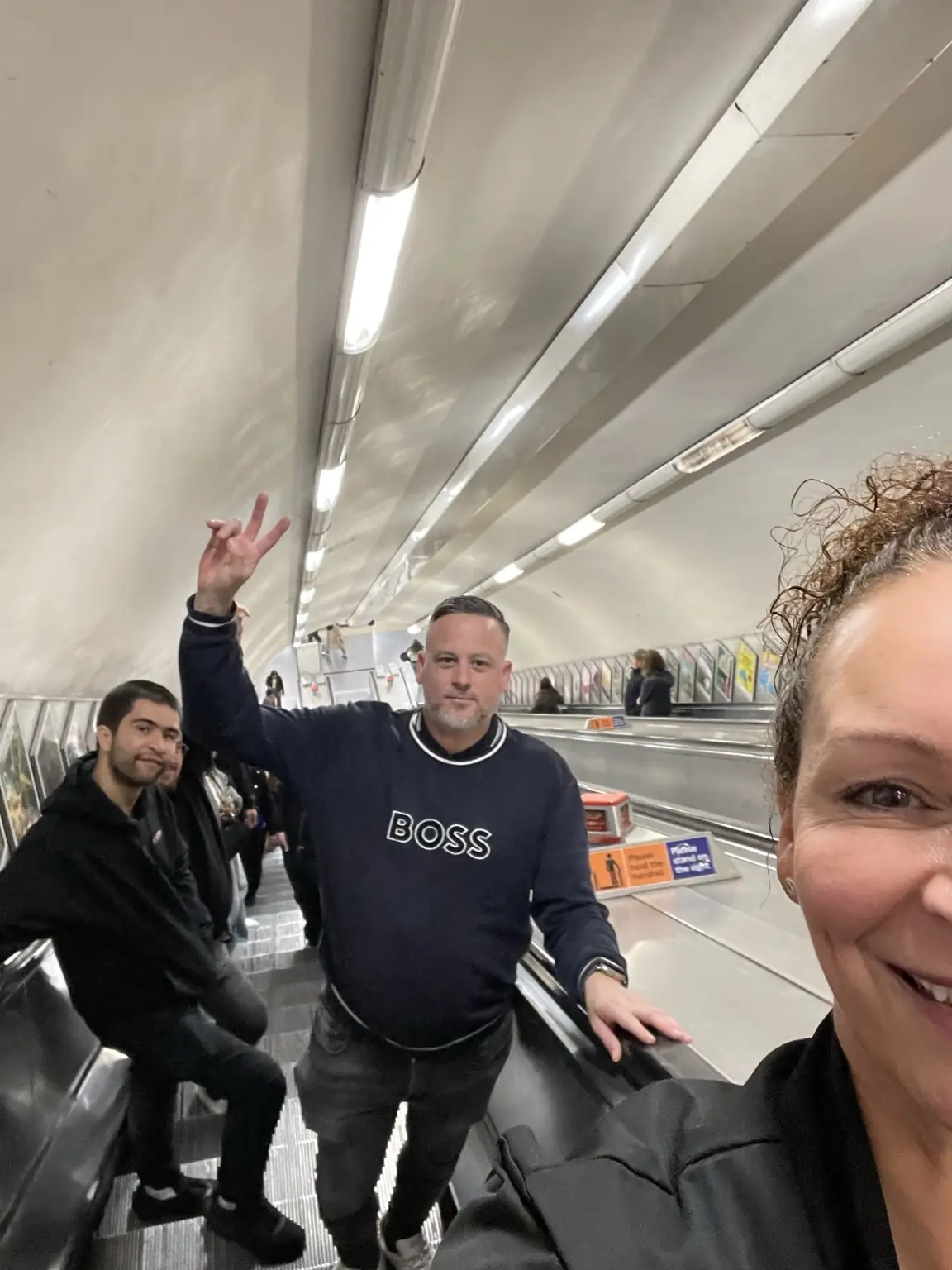 Lifted Spirits members travelling together on the London Underground