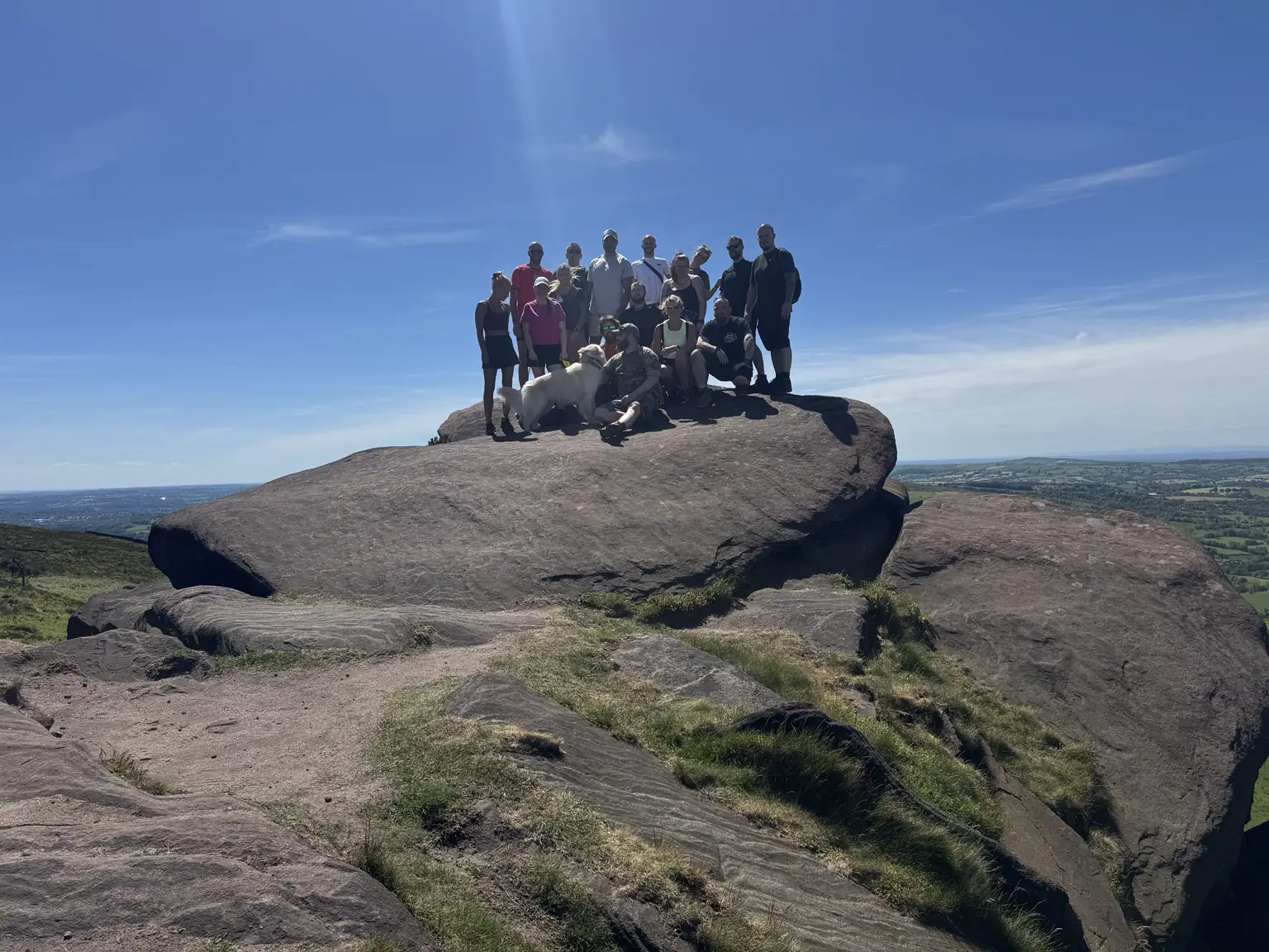Lifted Spirits members gathered on the rocks at The Roaches