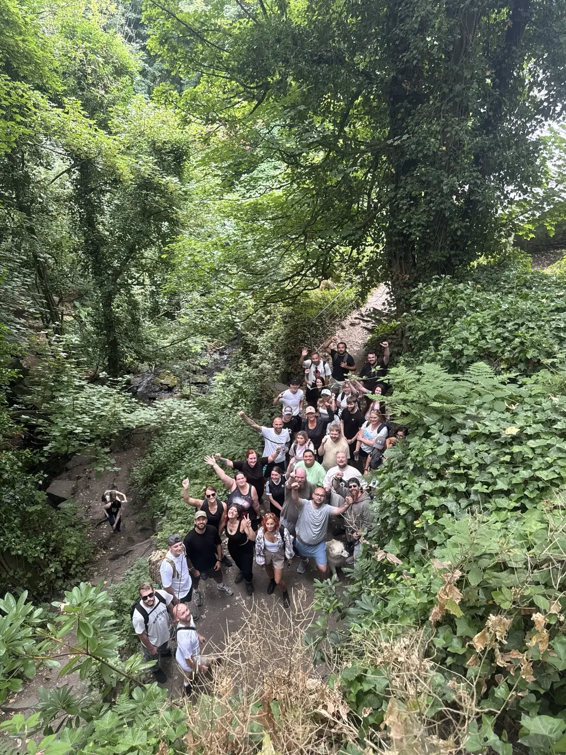 Lifted Spirits members near the waterfalls in Lumsdale Valley
