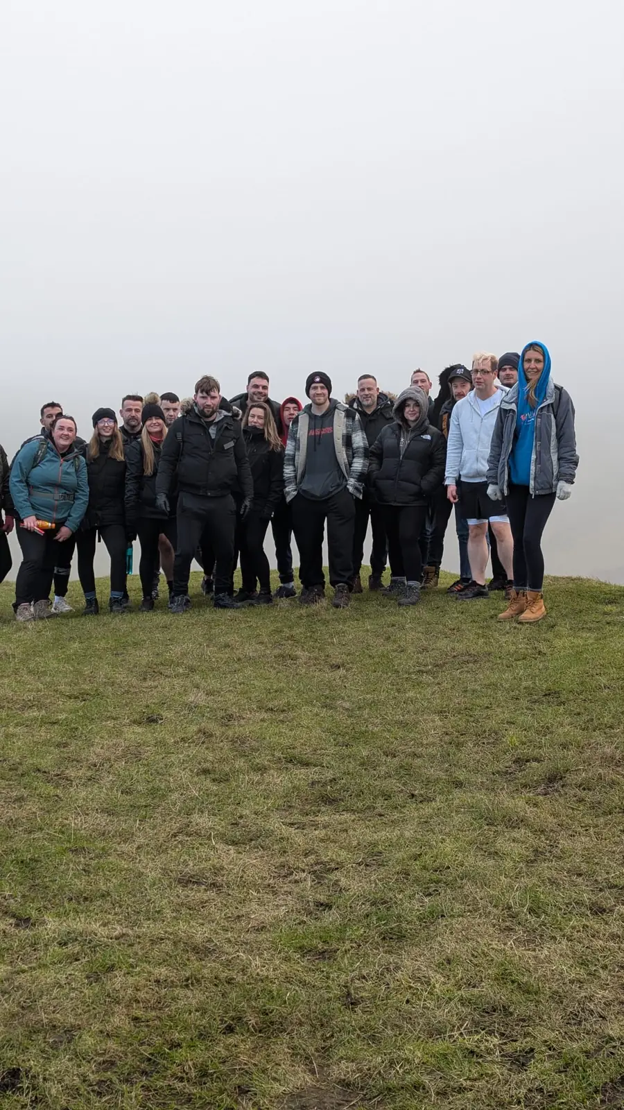 Lifted Spirits members together in misty conditions near Mam Tor