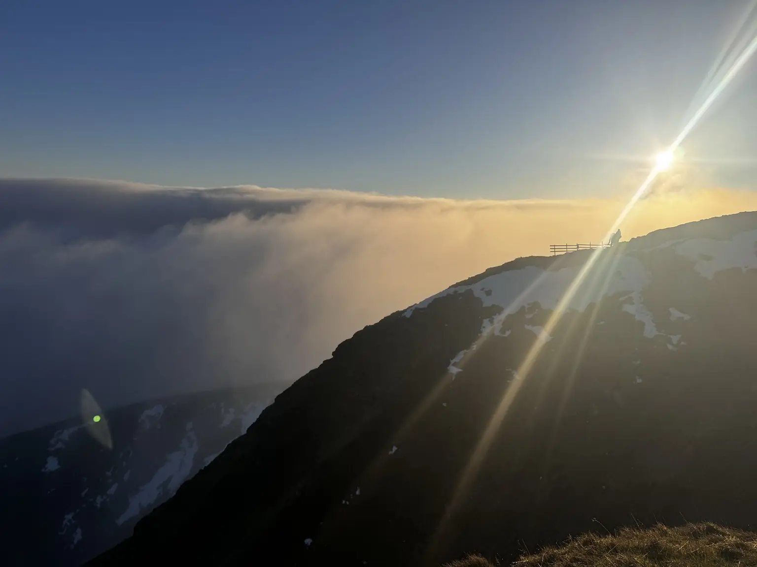Sunlight and cloud over Mam Tor during a Lifted Spirits community walk